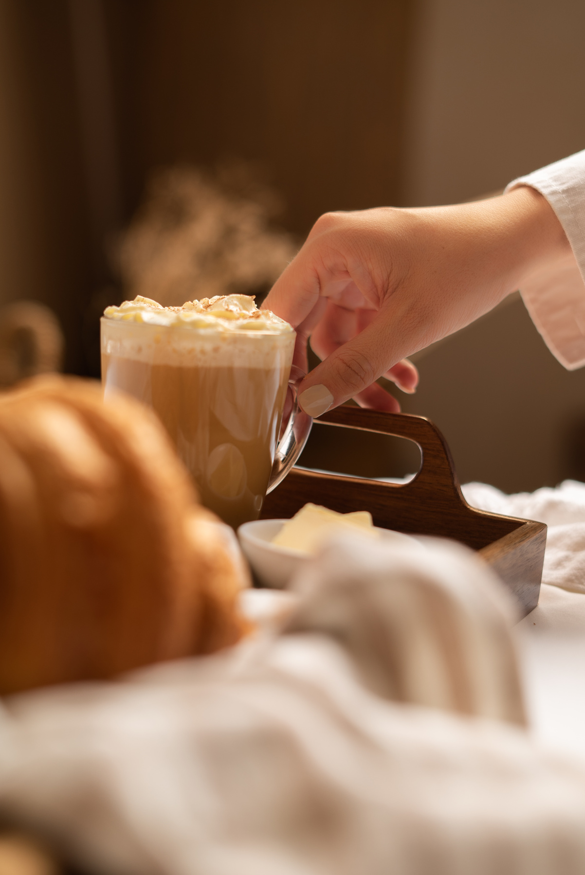 Person's Hand Holding a Glass of Coffee